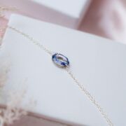 pulsera finita de plata con cristal circular sw tornazolado azul
