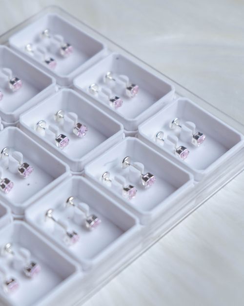 Abridores de plata con cubic rosa