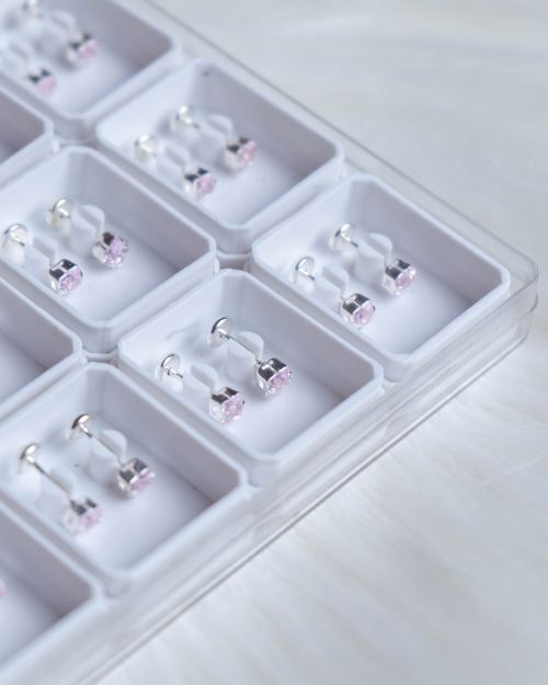 Abridores de plata con cubic rosa