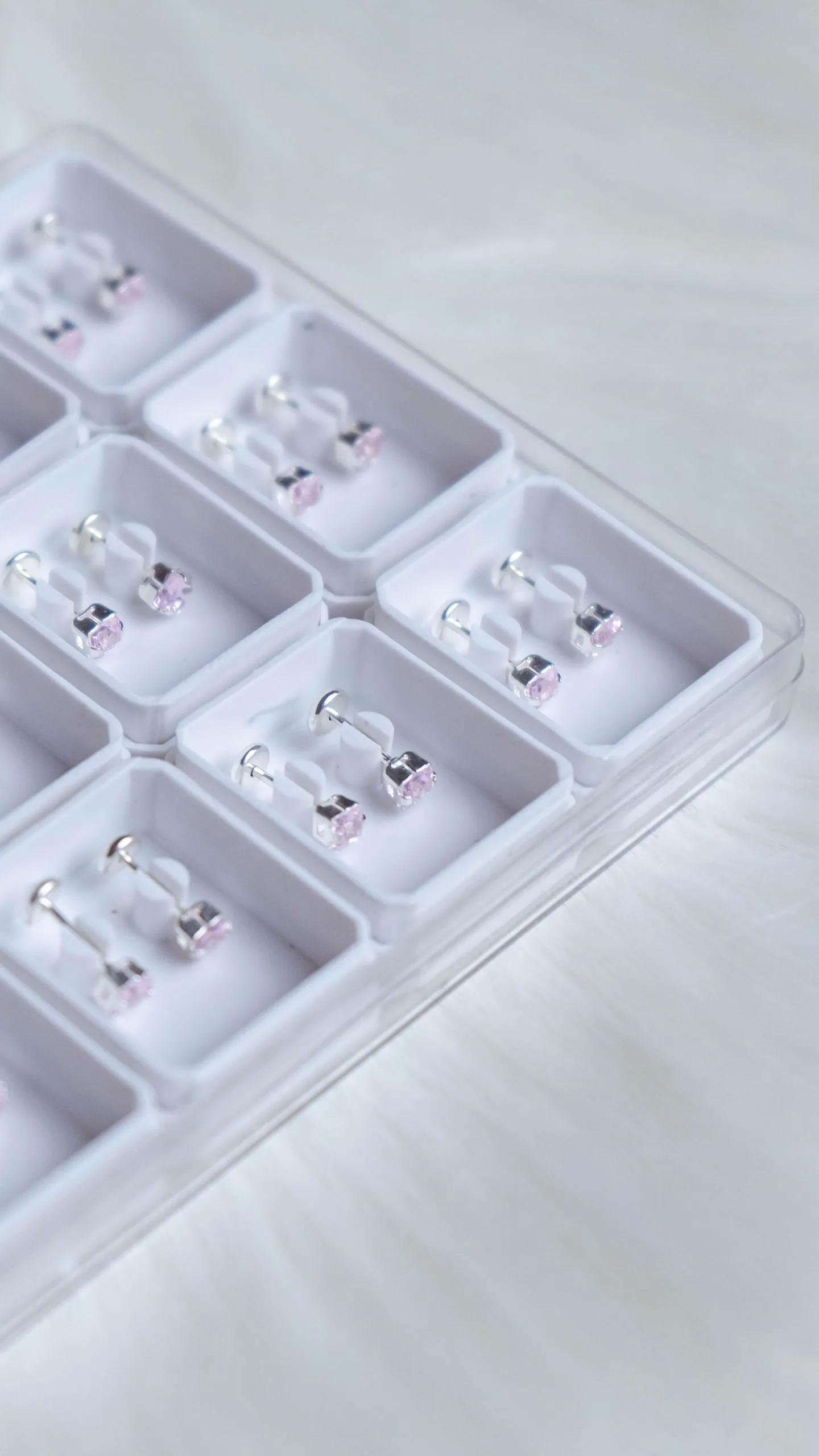 Abridores de plata con cubic rosa