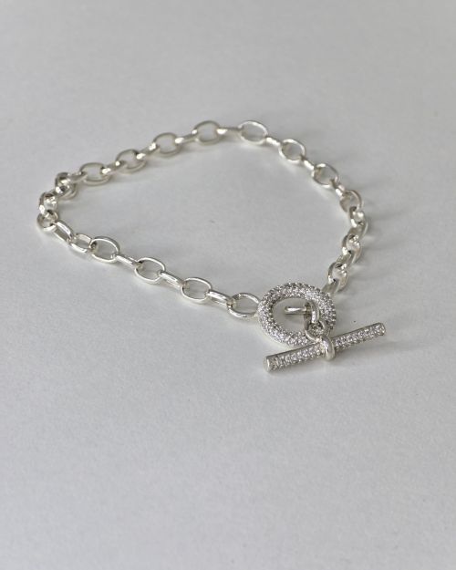 Pulsera rolo de plata con cierre micropave circulo