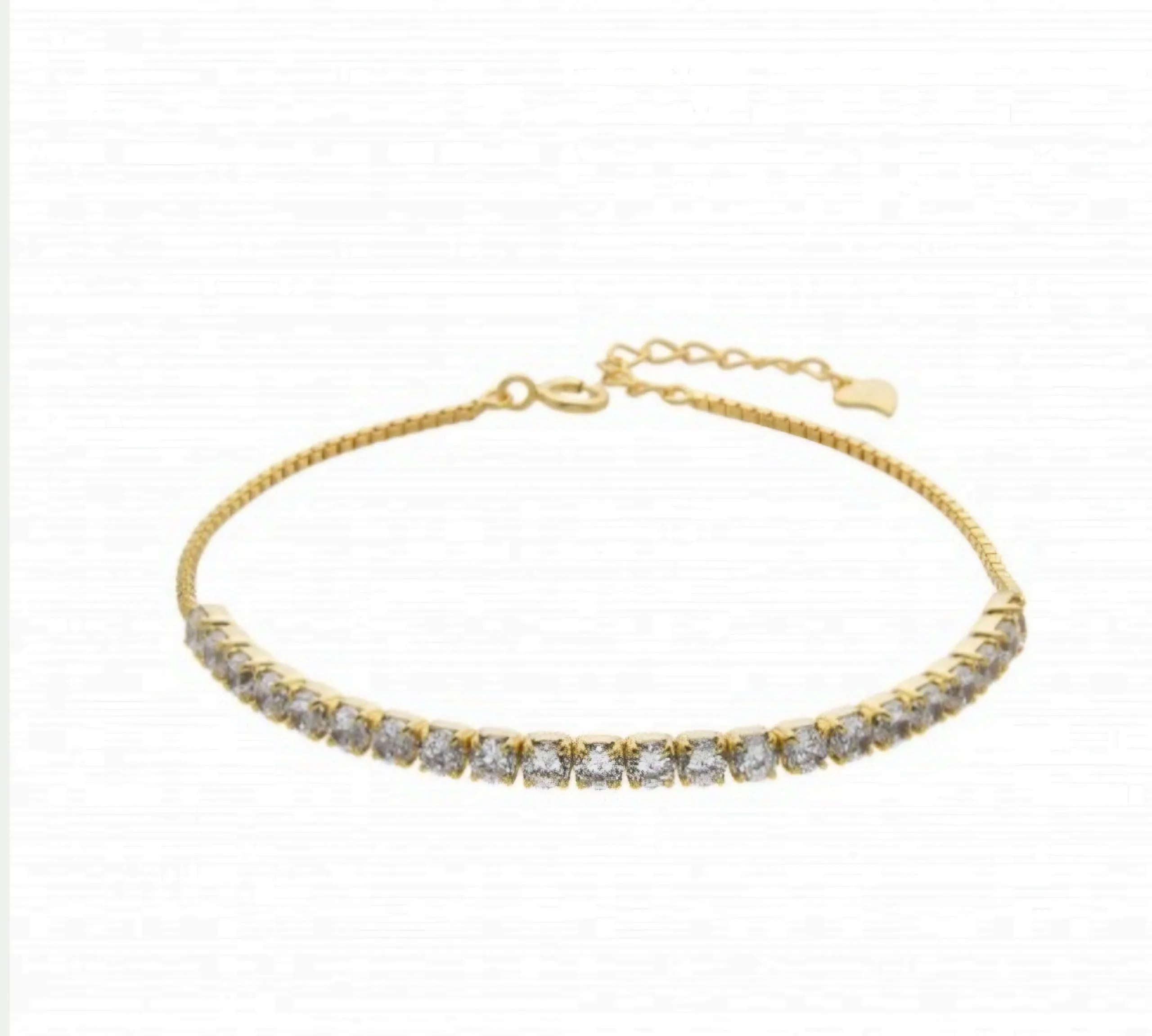 Pulsera tenis con baño dorado