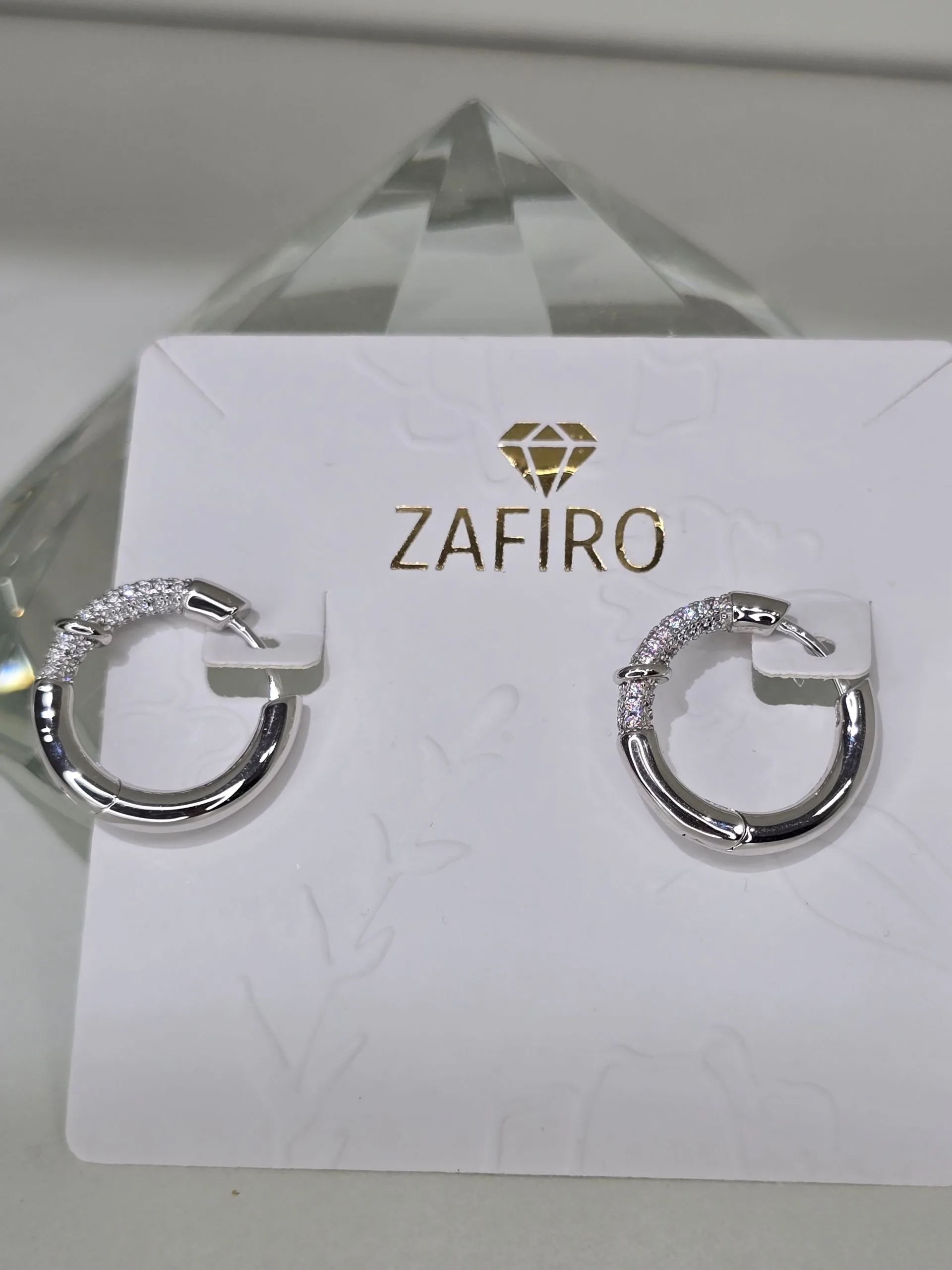 Argollas medianas de plata rodinada con pave