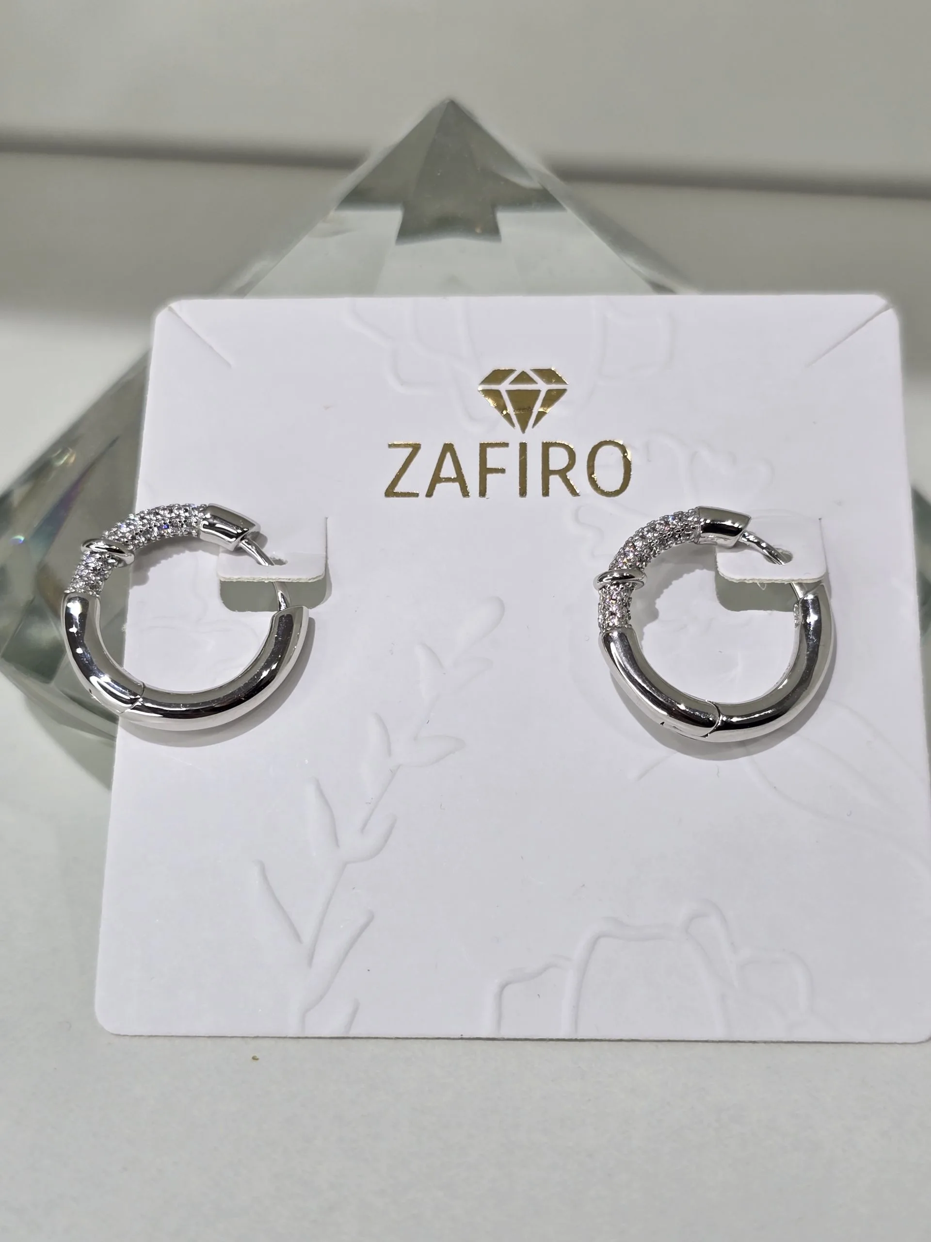 Argollas medianas de plata rodinada con pave