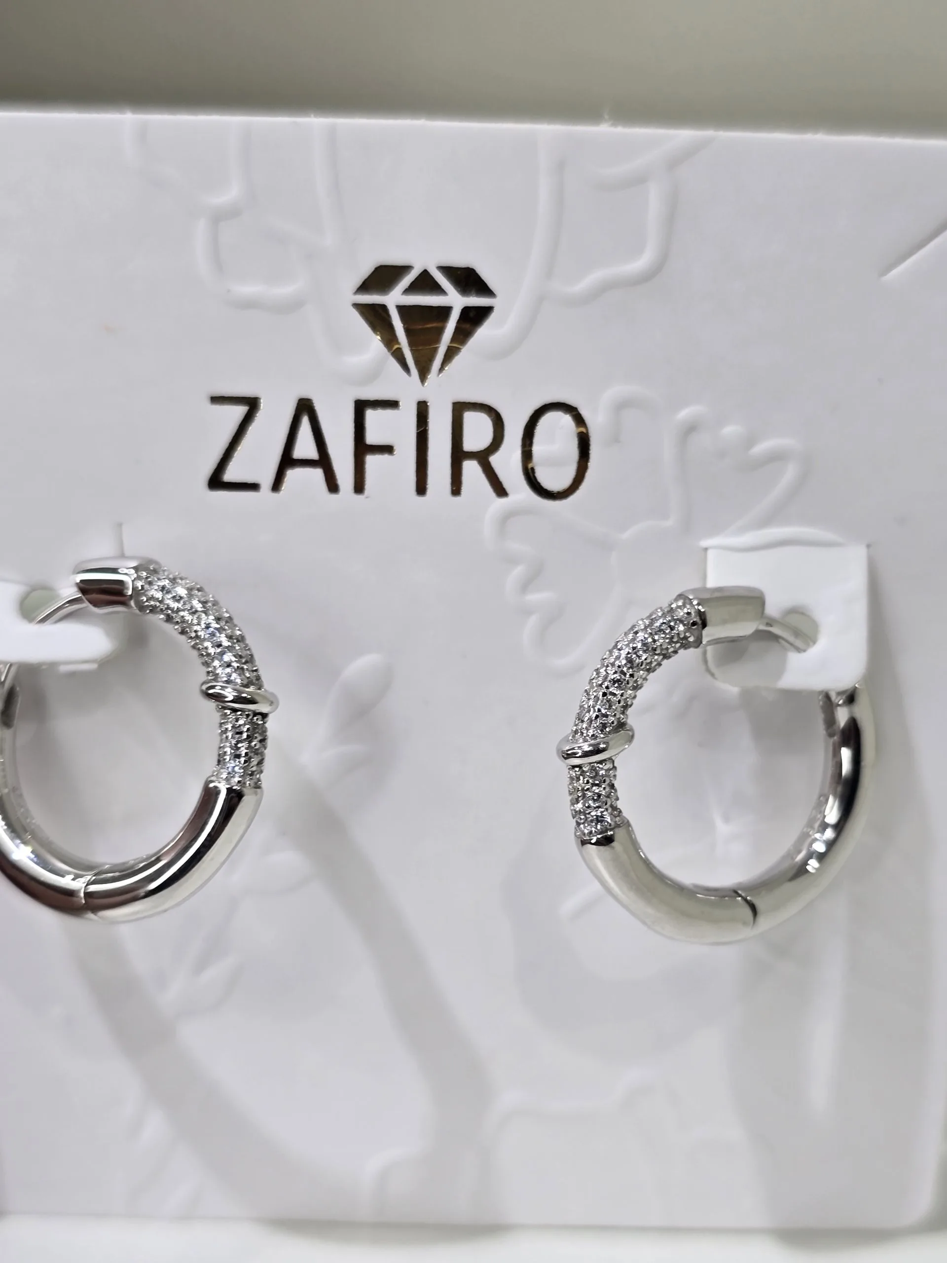 Argollas medianas de plata rodinada con pave