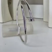 Esclava abierta clavo plata rodinada