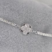 Pulsera de plata con dije flor