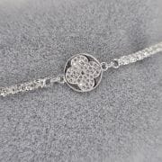 Pulsera de plata con dije flor