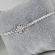 Pulsera de plata con dije flor