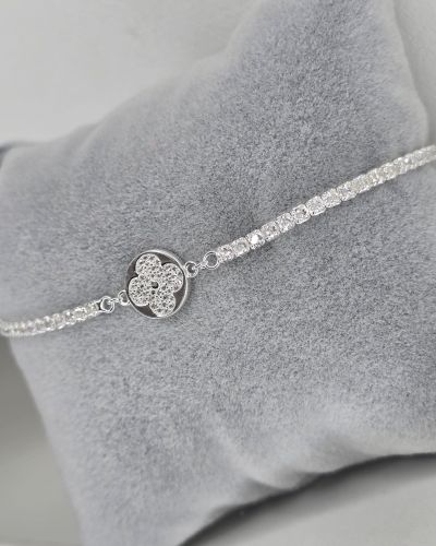 Pulsera de plata con dije flor