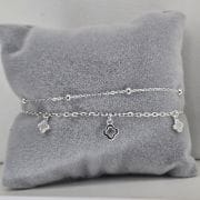 Pulsera doble con bolitas de plata y flores