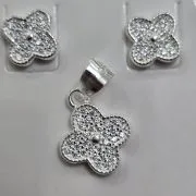 Conjunto de flor aros más dije Plata 925