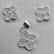 Conjunto de flor aros más dije Plata 925