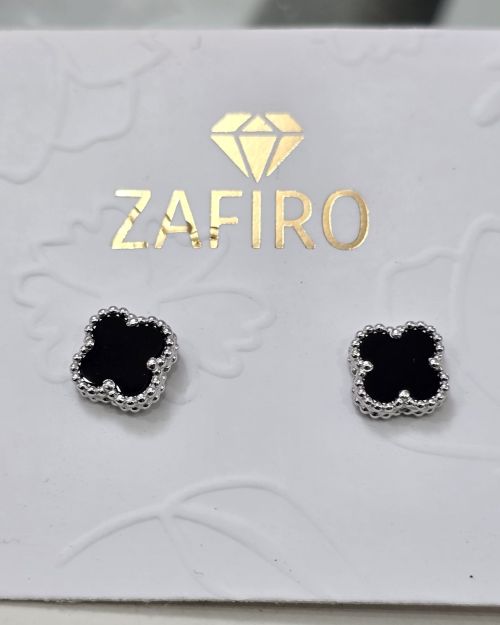 Aros pasantes van cleef de plata rodinada negros