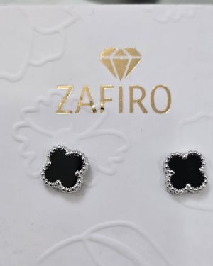Aros pasantes van cleef de plata rodinada negros