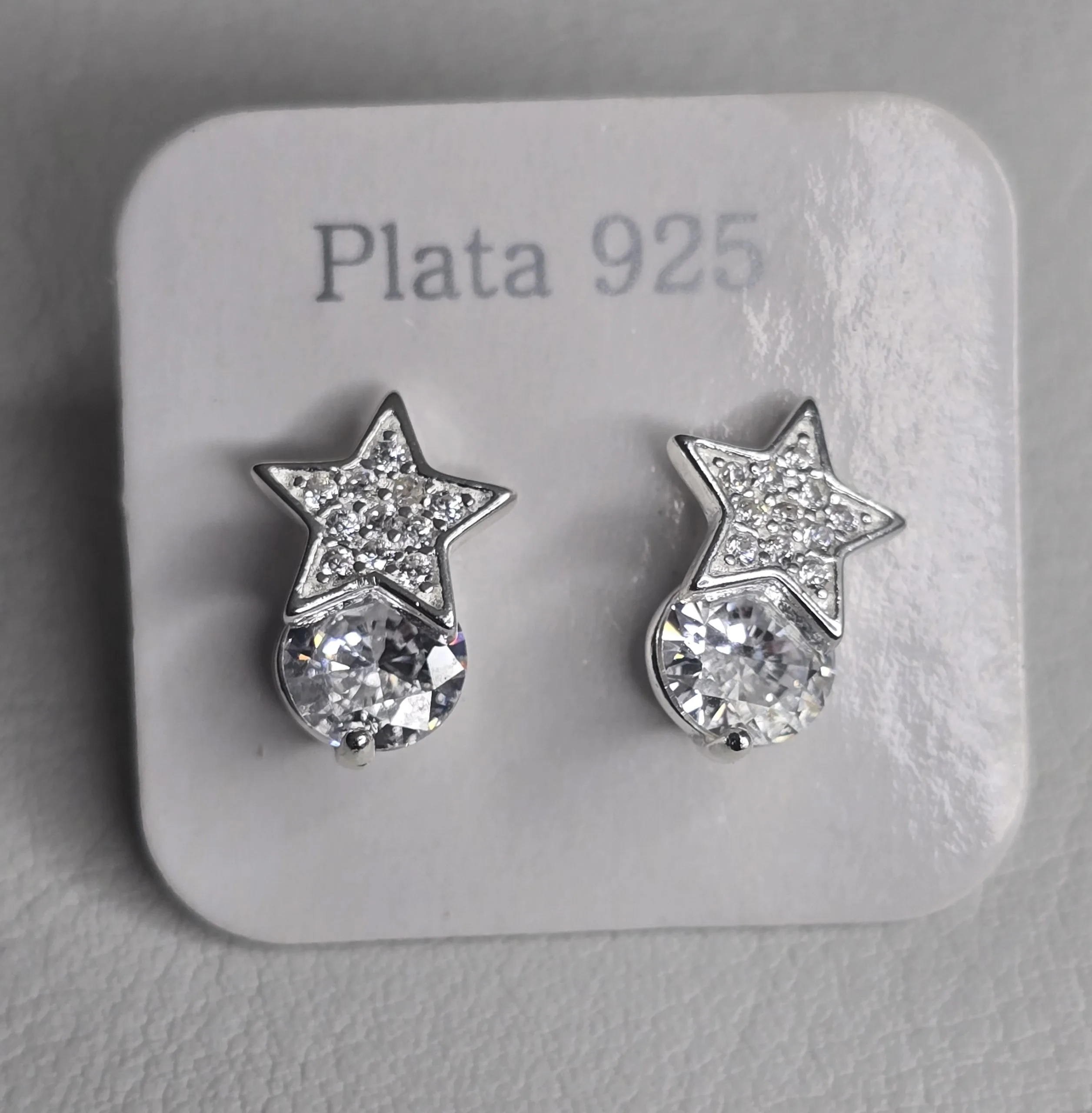 Aro plata de estrella con punto luz