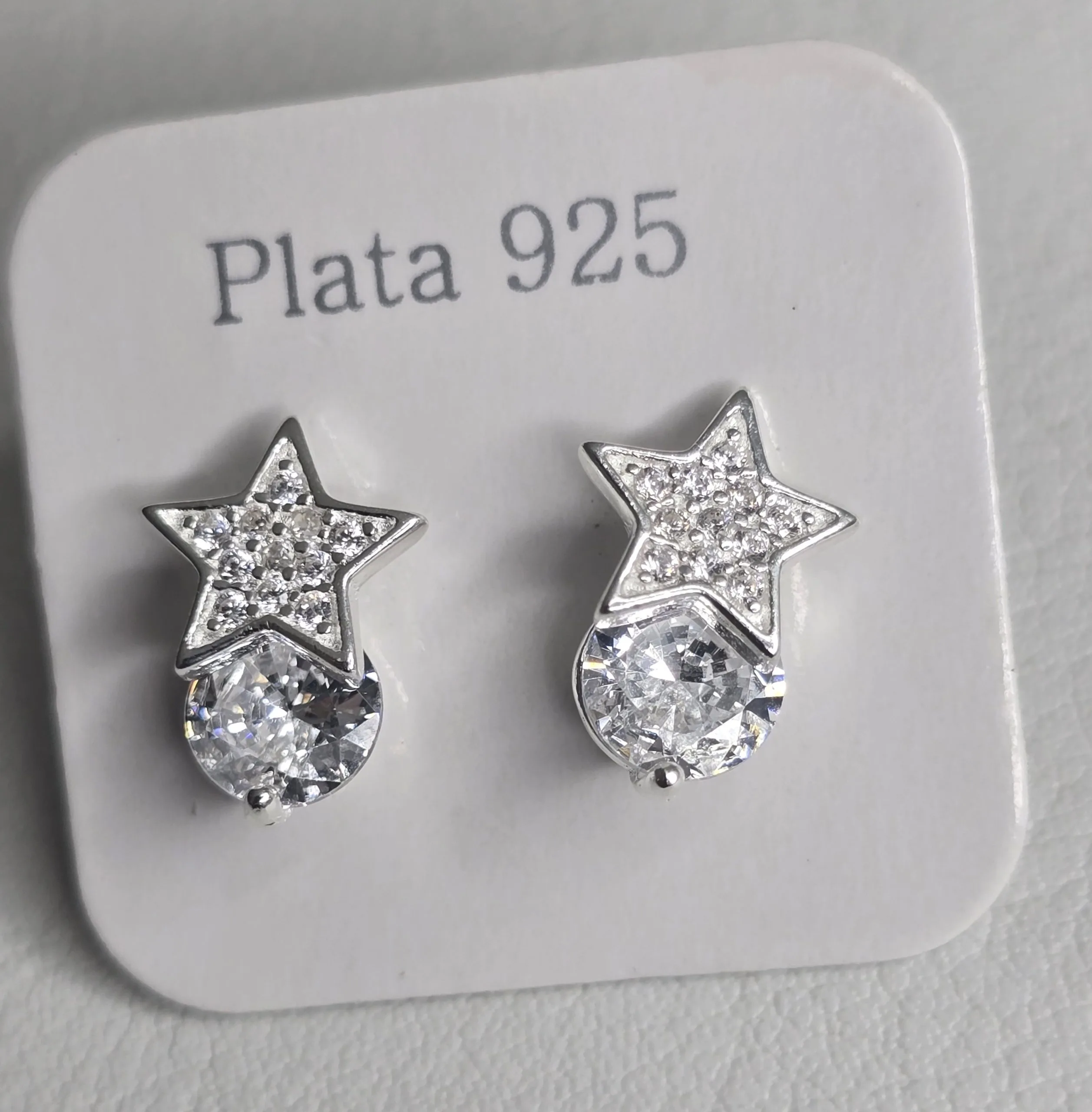 Aro plata de estrella con punto luz
