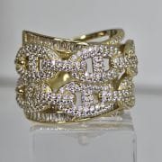 Anillo ancho importante plata rodinada con baño gold eslabones