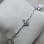 Pulsera flores con forcet plata rodinada