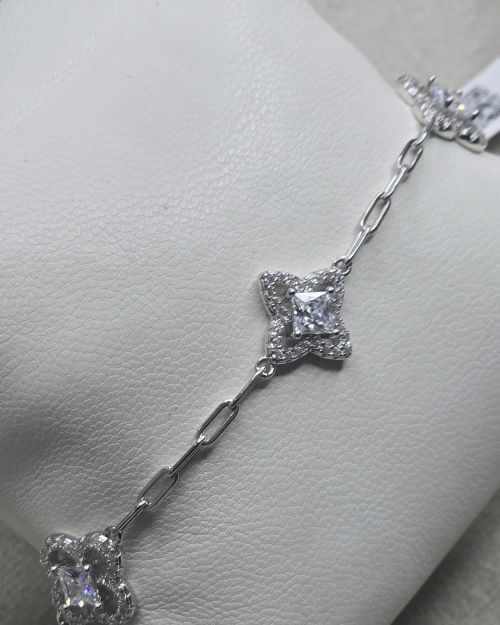 Pulsera flores con forcet plata rodinada