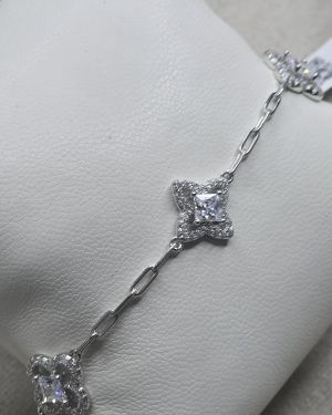 Pulsera flores con forcet plata rodinada