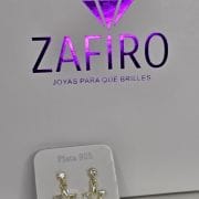 Aros pasantes estrella de plata con baño gold punto luz