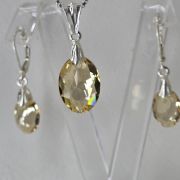 Aros brisura ovalados ambar plata -cristal swarovski