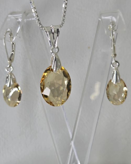 Aros brisura ovalados ambar plata -cristal swarovski