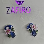 Zarcillos de flor azules esmaltados plata
