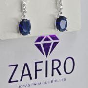 Aros pasantes ovalados azules con cubic