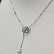 Cadena rodinada con aro más perla punto luz caida