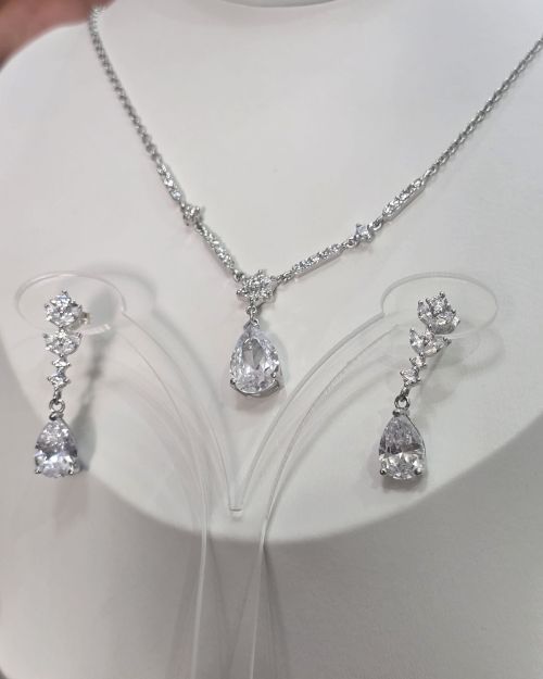 Conjunto gota plata rodinada cadena más aros