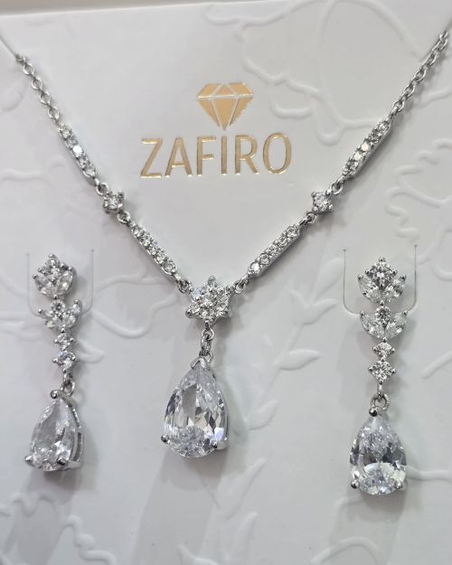 Conjunto gota plata rodinada cadena más aros