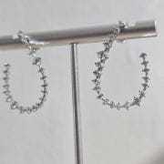 Zarcillos zig zag cubic pasantes rodinados