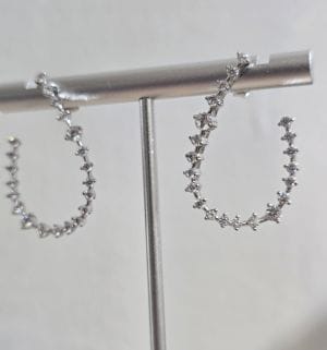 Zarcillos zig zag cubic pasantes rodinados