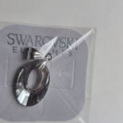 Dije cristal swarovski calado ovalado gris