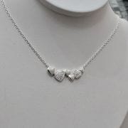 Cadena con dije incorporado de corazones .Plata925