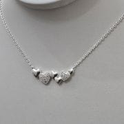 Cadena con dije incorporado de corazones .Plata925