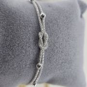 Pulsera doble Plata italiana con bolitas y nudo