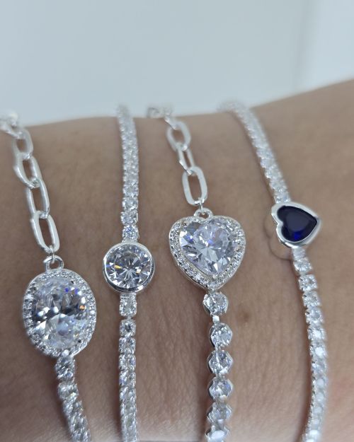 Pulsera tenis plata con punto de luz circular