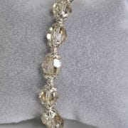 Pulsera plata con cierre marinero y cristales autenticos color maiz