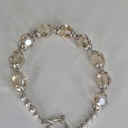 Pulsera plata con cierre marinero y cristales autenticos color maiz