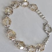 Pulsera plata con cierre marinero y cristales autenticos color maiz