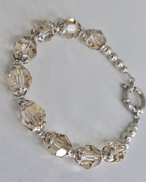 Pulsera plata con cierre marinero y cristales autenticos color maiz