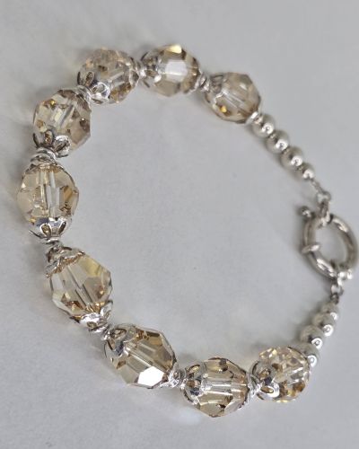 Pulsera plata con cierre marinero y cristales autenticos color maiz