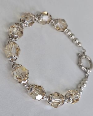Pulsera plata con cierre marinero y cristales autenticos color maiz